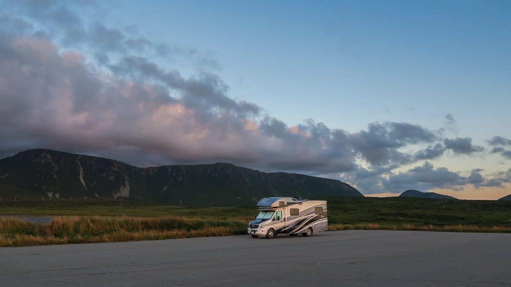 Vik the View in a gravel parking area at sunset the night before we were set to leave Newfoundland and head back to Nova Scotia