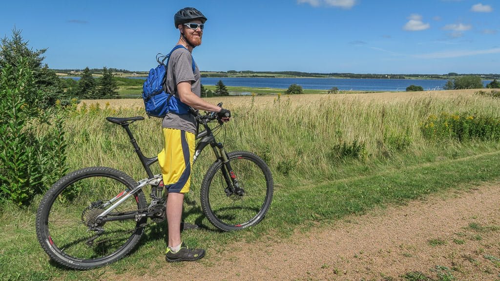 Buddy taking in the views with his bike while cycling part of the Confederation Trail