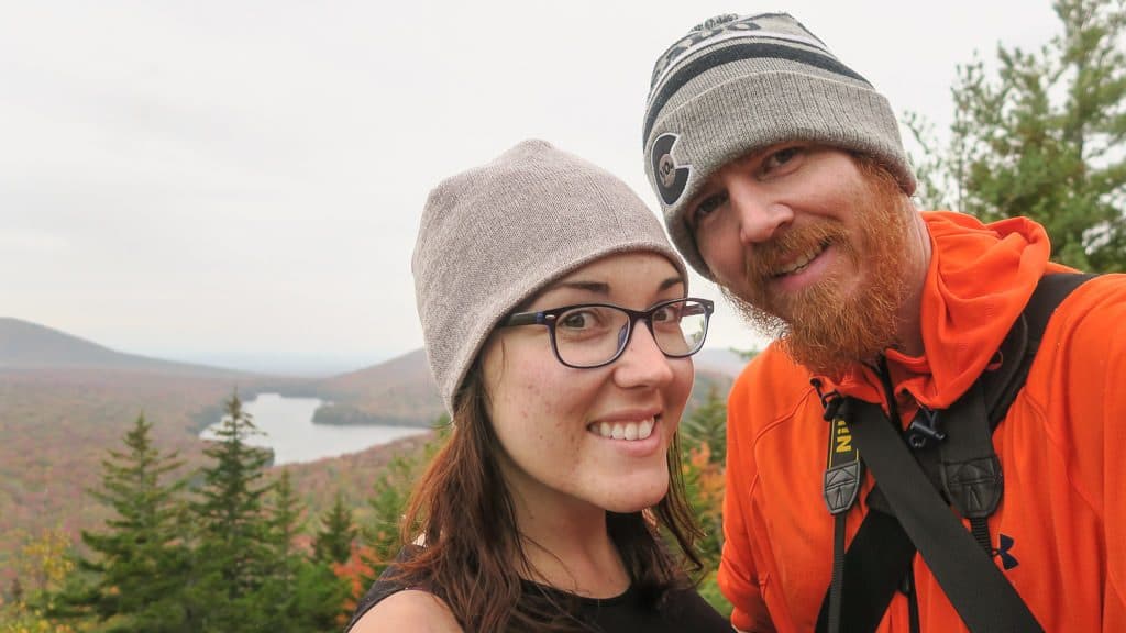 Brooke and Buddy taking a photo at the top of Owl's Head Overlook