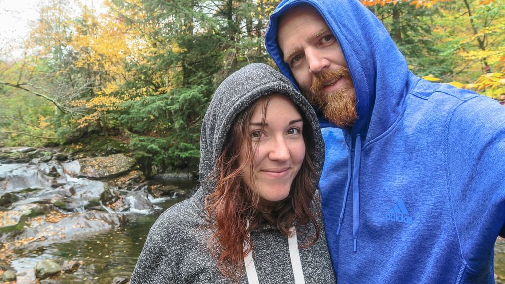 Brooke and Buddy in the colorful woods of Vermont in Fall