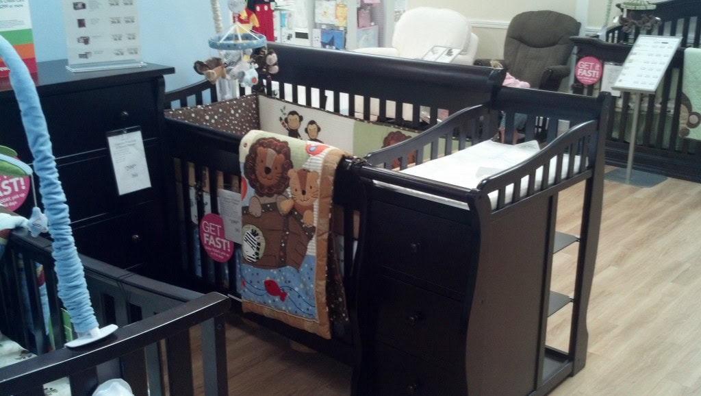 I am thinking this is the crib set-up I will be going for, its just about the same size as Denny's box so it will sit right where that is. It's kinda nice that it has it's own storage and since I don't have much free open space the changing area is pretty important. By that time Denny will be all set to just be left out.