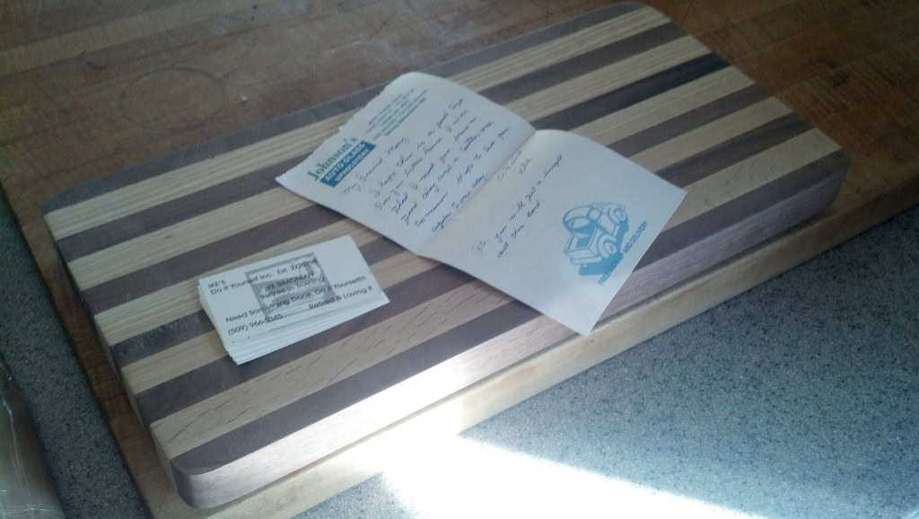 First and foremost, look at how awesome this is!  While in Minnesota a couple weeks ago I was talking with Grandpa Ike about my project and he told me he was going to make me a custom oak and black walnut cutting board, it is SO pretty!