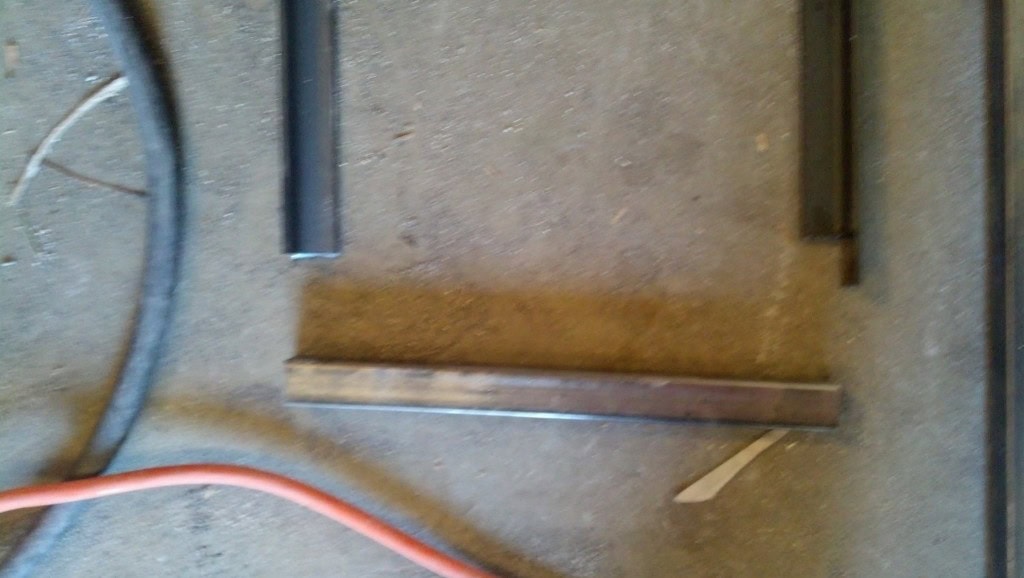 a detail shot of how the ends will be welded together.  We [Nate] notched the angle so that it will be flush on front! 