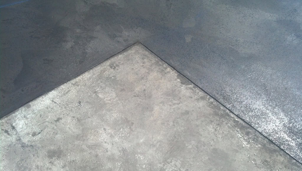 This has very little to do with anything other than a building we designed at work is going up and they are using stained concrete, it still needs polished but I think it looks pretty awesome, cool graphite colored floors for a doctors office
