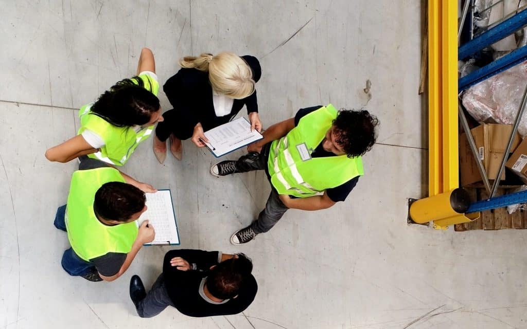 warehouse employees stand-up