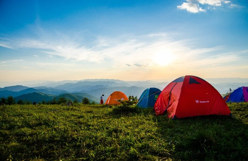 Tent camping on a hillside