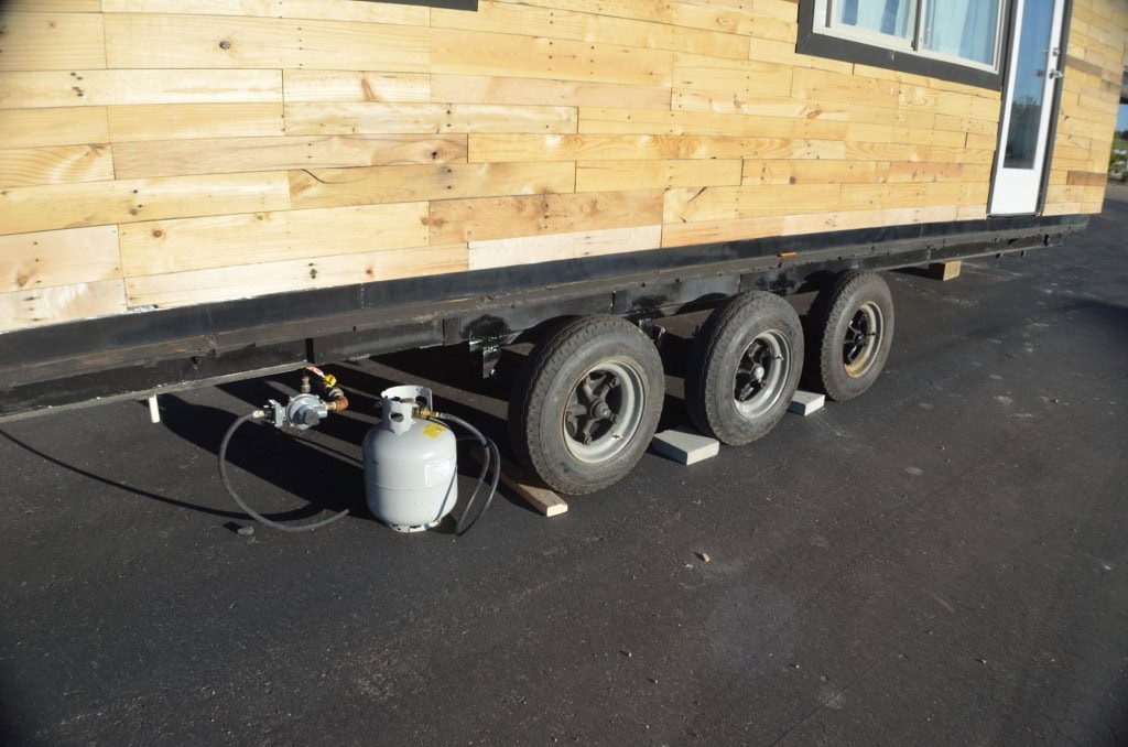 I am MUCH more comfortable with with the clearance on the new tires.  Dad worked his butt off and almost burned his leg off for these, I think it adds a couple years to my life to not worry about the way the tires were before :) 