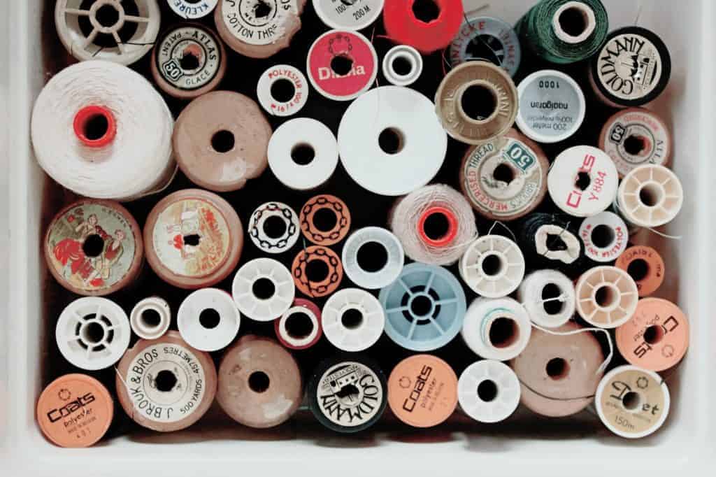 Buy Fabric Online - Stacks of colorful on the bolt fabric