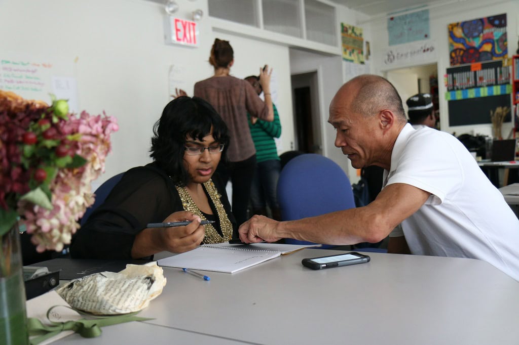 A professor mentoring a student.