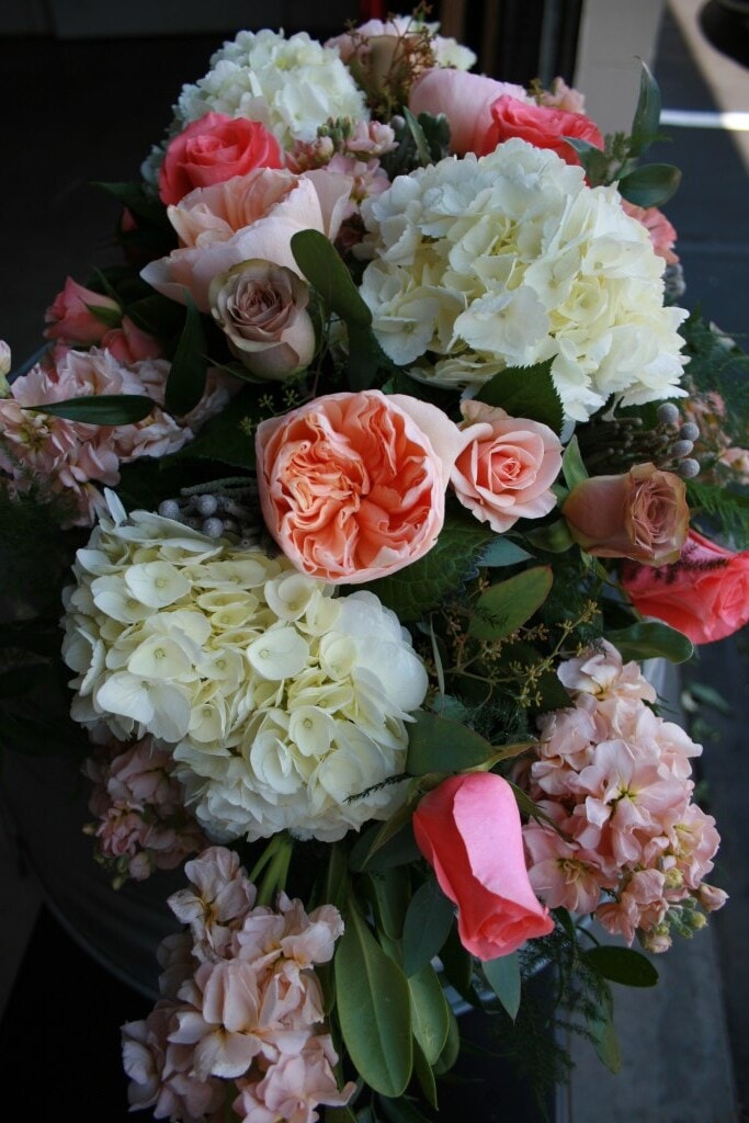 Arch Flowers. peach, ivory, coral, grey and brown.