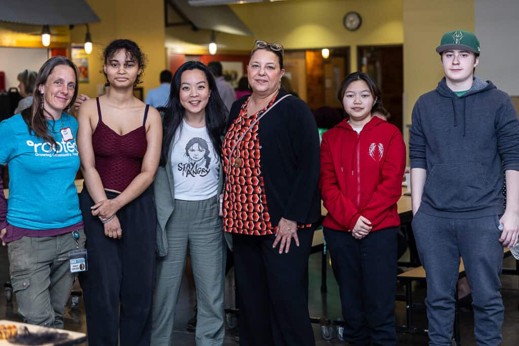 Co-Executive Director of Rooted, Hedi Rudd, with Board President, State Representative Francesca Hong, and Sarah Karlson, and Youth employees.