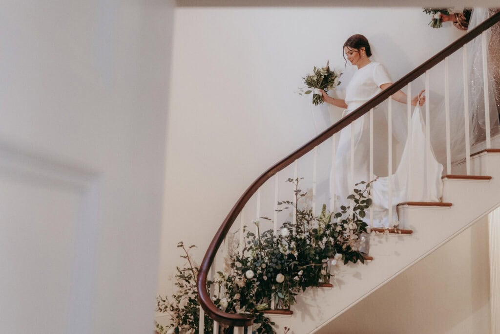 Floral staircase at Aswarby Rectory Wedding, Sleaford