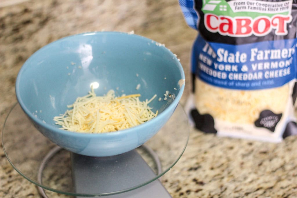 Measuring cabot cheese used in the recipe.