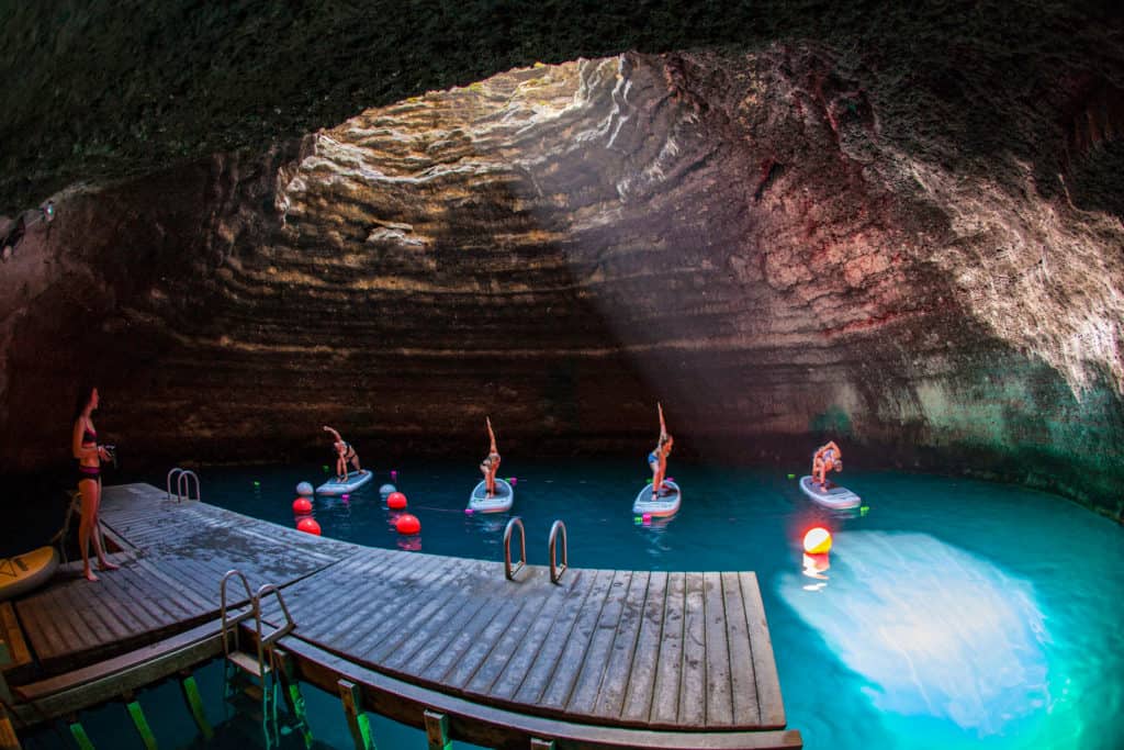 Yoga class on stand up paddleboard at Homestead Crater