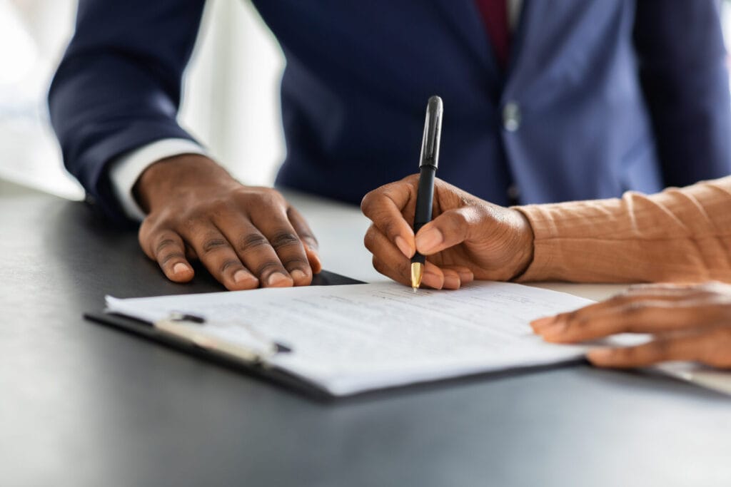 Female Renter Signs Lease Papers