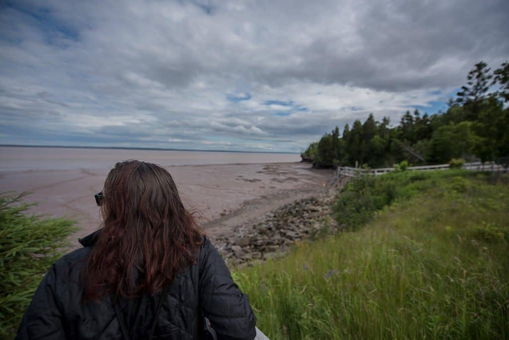 Brooke taking in the views from a more secluded portion of Hopewell Rocks