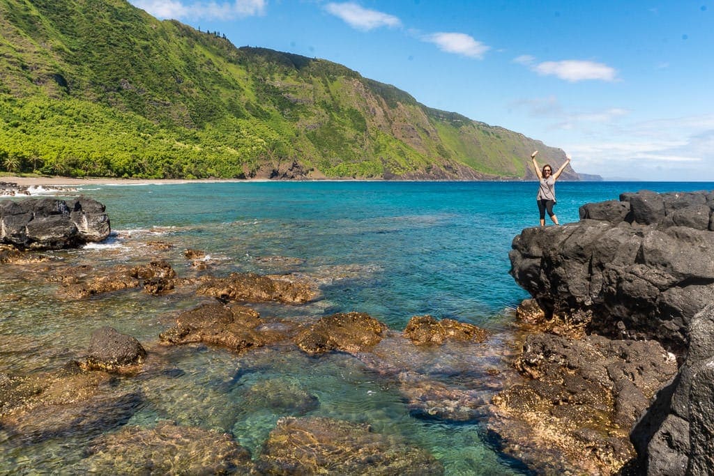 Brooke at rocky beach after Hiking down to Kalaupapa in Molokai