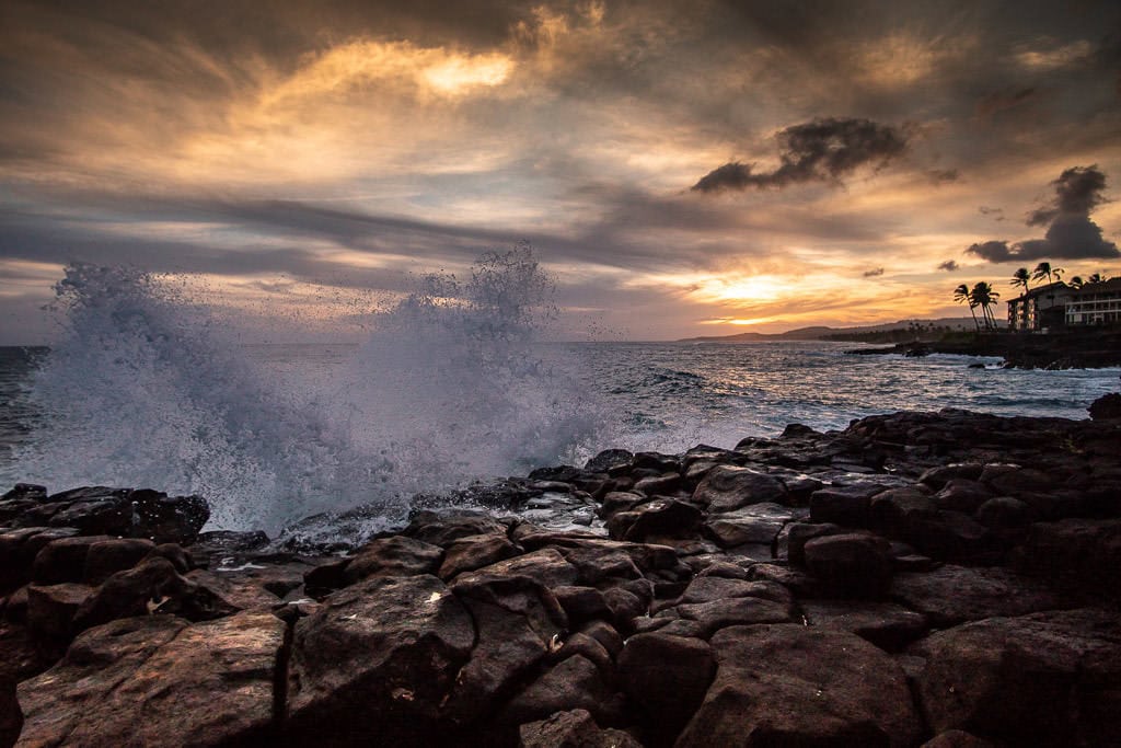 beautiful ocean views of kauai with waves and sunset