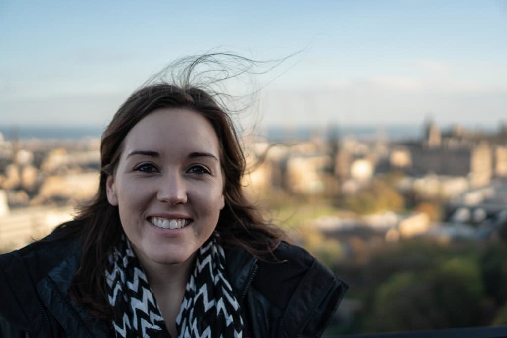 brooke with calton hill views of Edinburgh Scotland during our weekend in Edinburgh