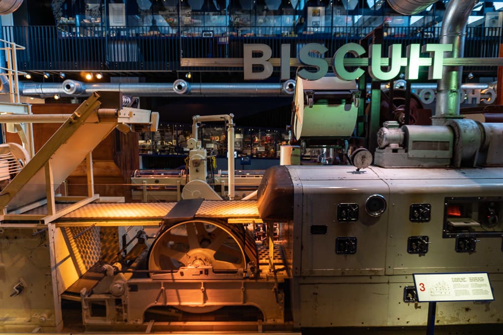 biscuit making machine at zaans museum in zaanse schans on day trip from amsterdam