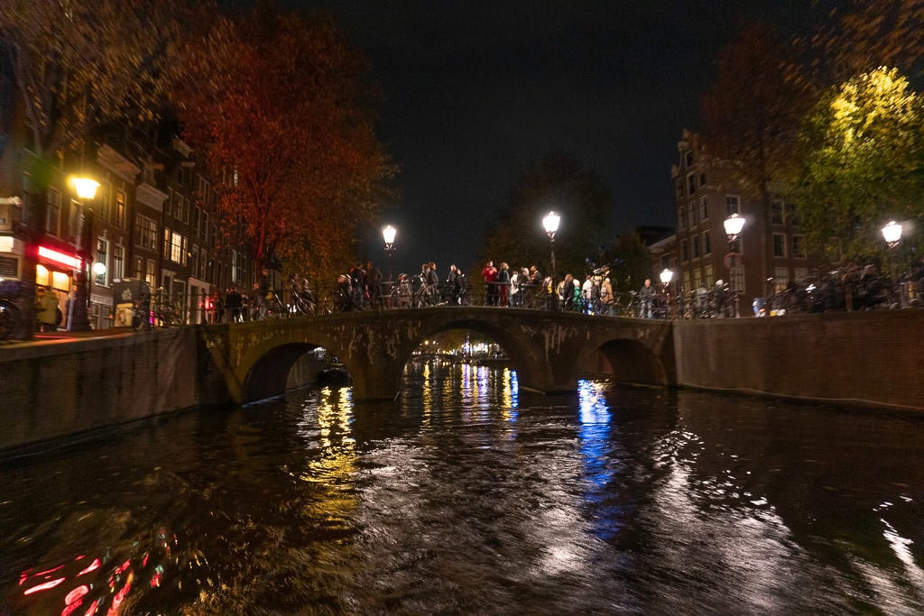 amsterdam red light district at night from canal