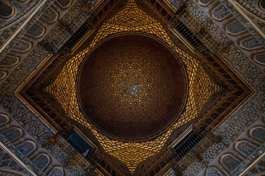 ornate gold ceiling in the real alcazar in sevilla spain