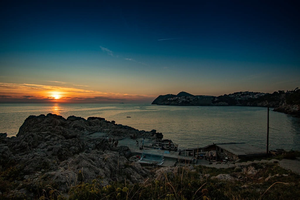 Sunset over Danče Beach with some locals playing a little footie