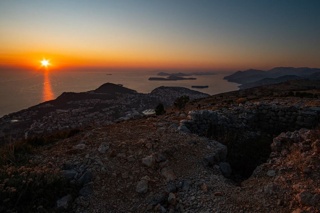 sunset from Mount Srd with some of the old fortress bunkers in the foreground