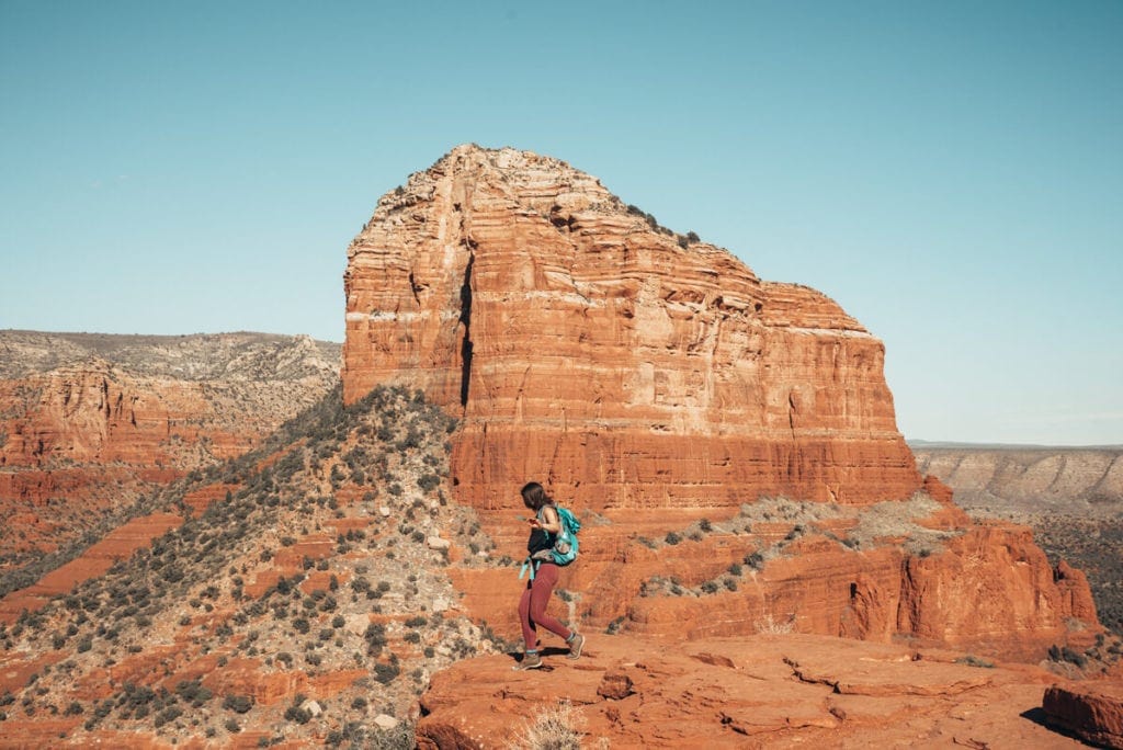 Girl hiking Bell Rock for sunset
