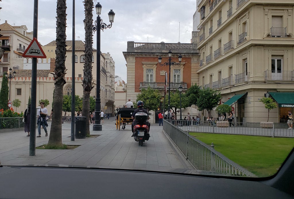 motorcycle on sidewalk in sevilla spain