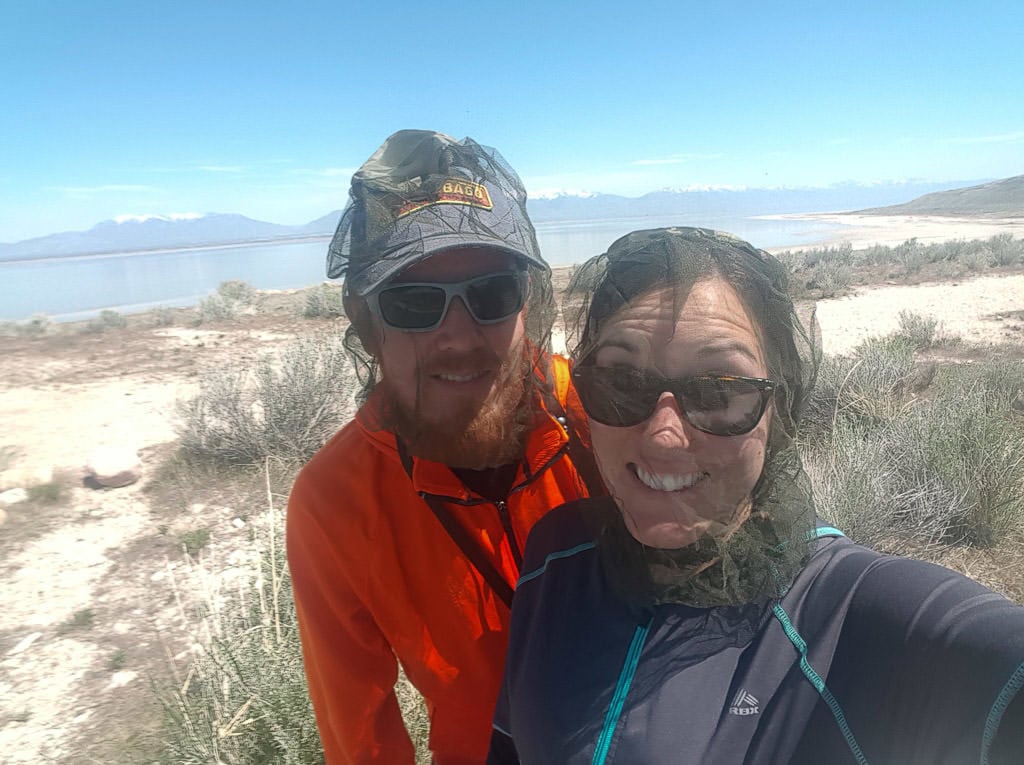 Brooke and Buddy with light jackets on and head-nets over their heats to prevent the biting gnats from getting to them.