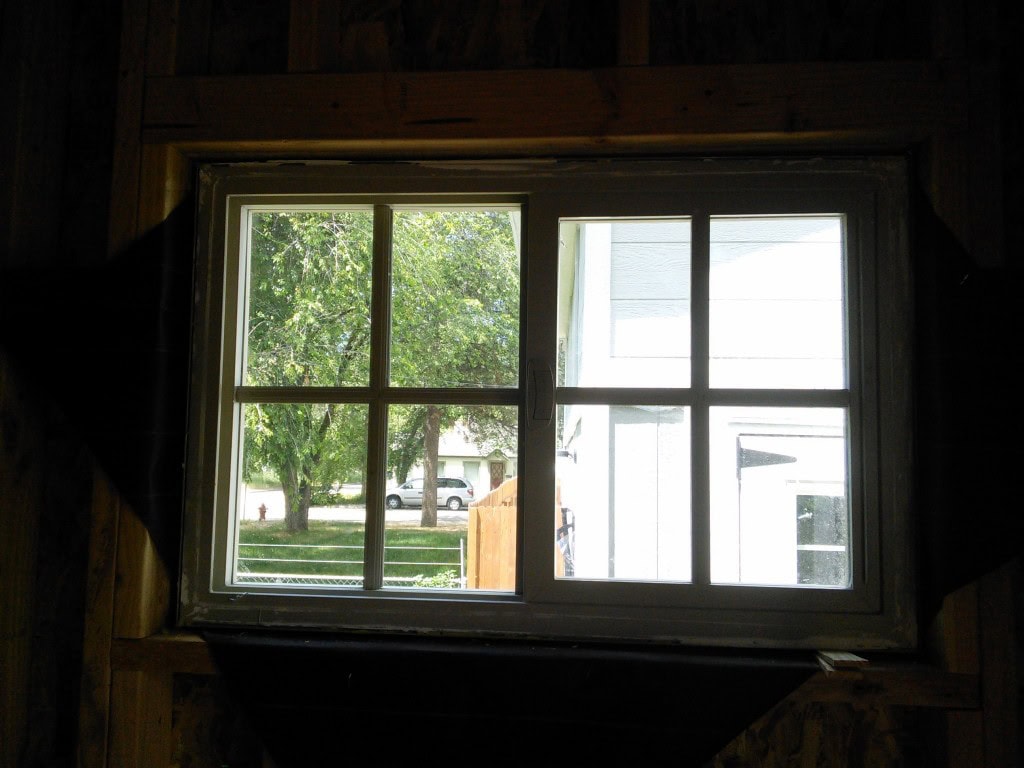 The window is tall enough that we adults can see out, there is a full glass door for the kiddos to peer out of, Hazel will be able to see out of here from her bunk bed but I can still cover it and have it be nice and dark in the daytime