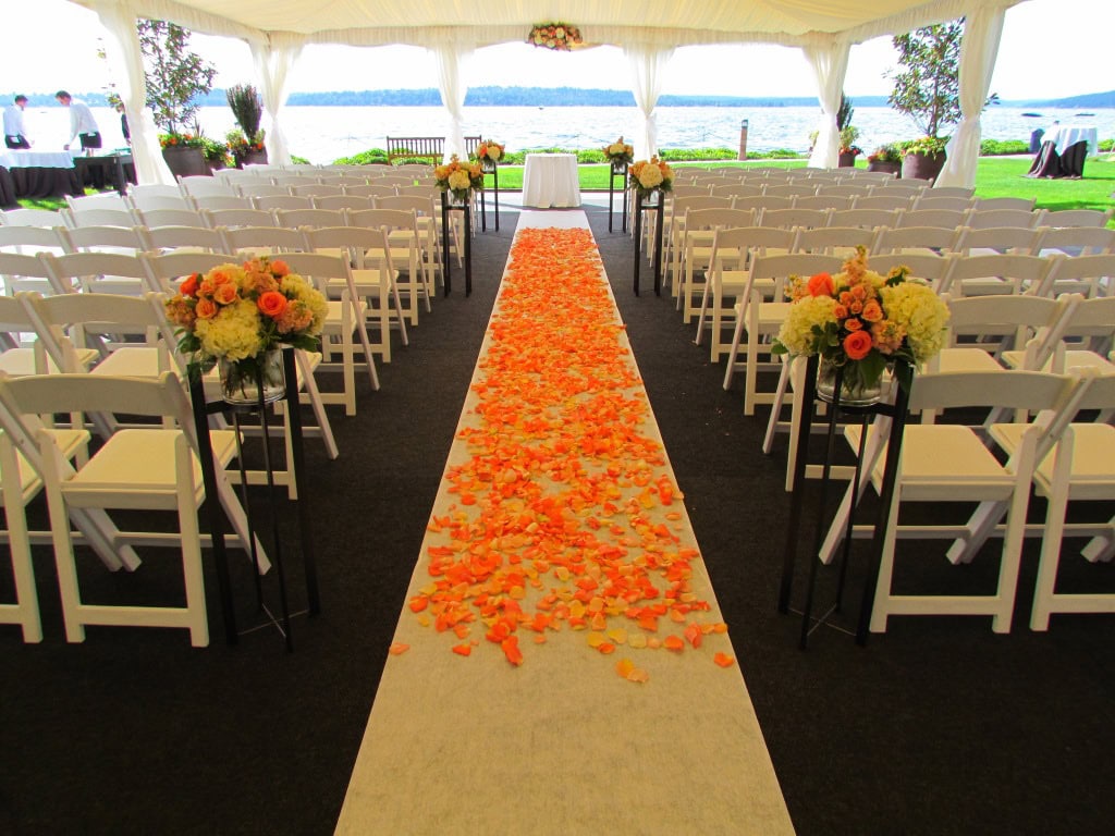 coral and peach Aisle petals. woodmark hotel