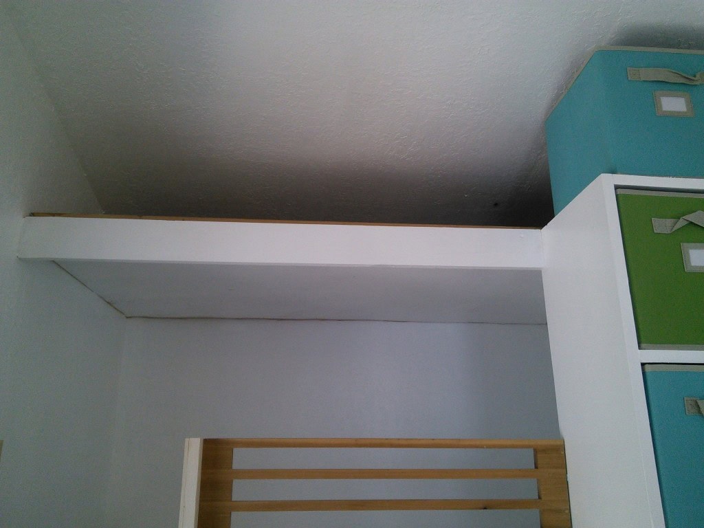 And that up above is storage for toys so that I can rotate them and keep things 'fresh' and new feeling.