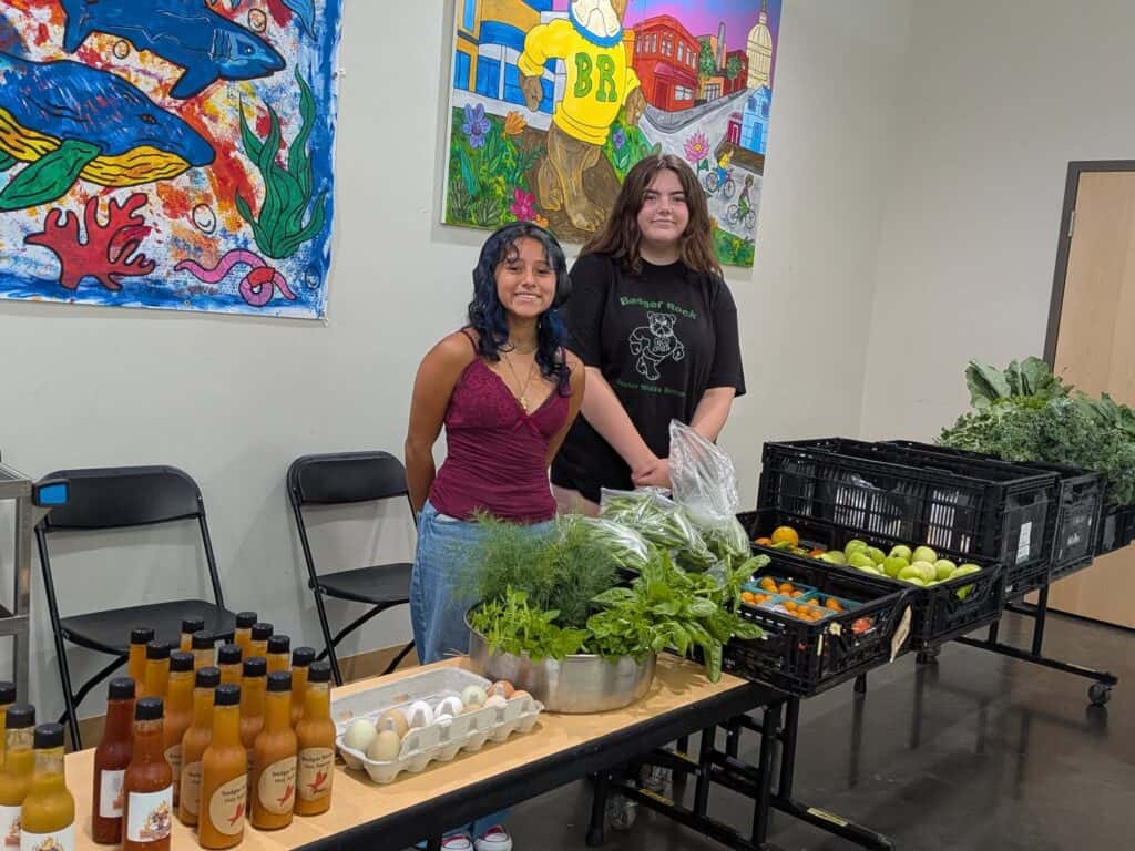 Rooted Youth Employees working at the Badger Rock Market