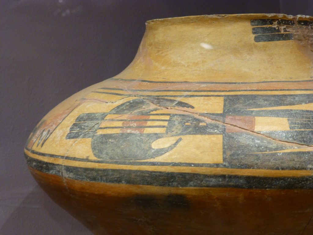 Prehistoric ceramic pot decorated with a parrot. what to do in Albuquerque? Go to Maxwell Museum of Anthropology