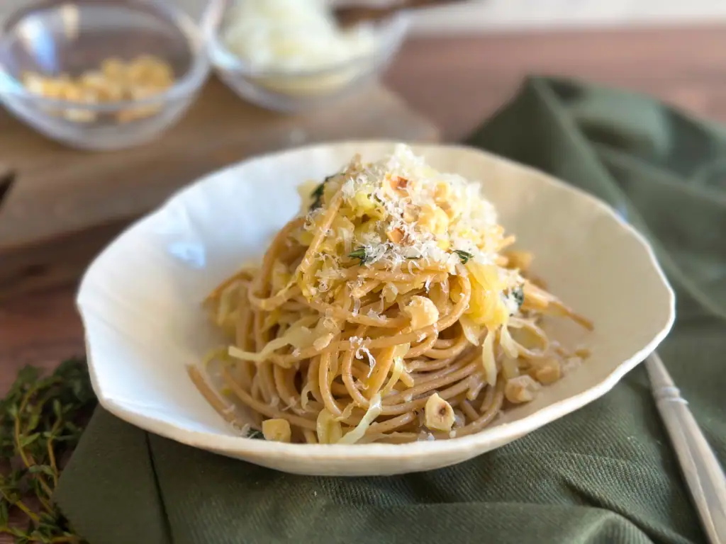 Lateral close up of caramelized cabbage pasta.