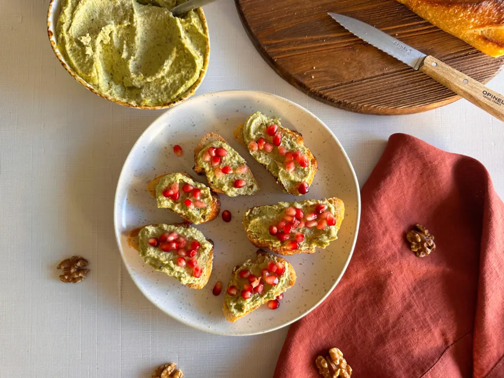 crostini with walnut sauce in a white plate