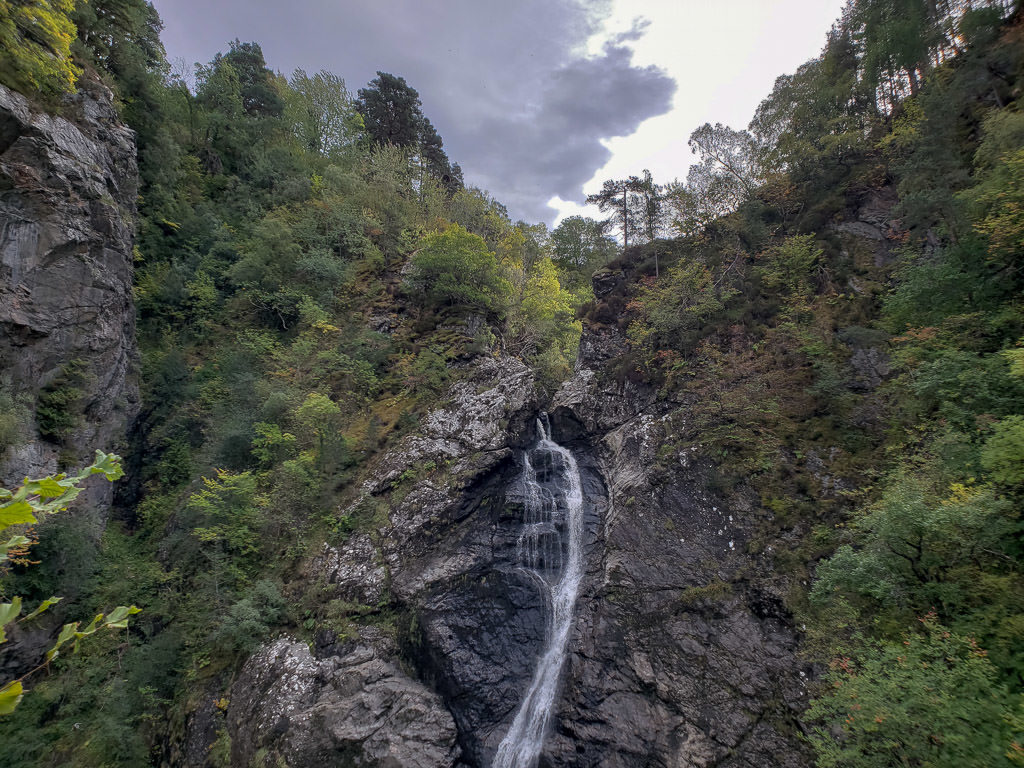 The thin Falls of Foyers up close coming down the side of a large cliff