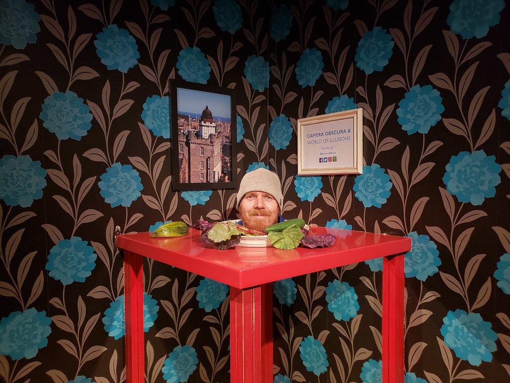 looking like a head on a platter at camera obscura in Edinburgh Scotland