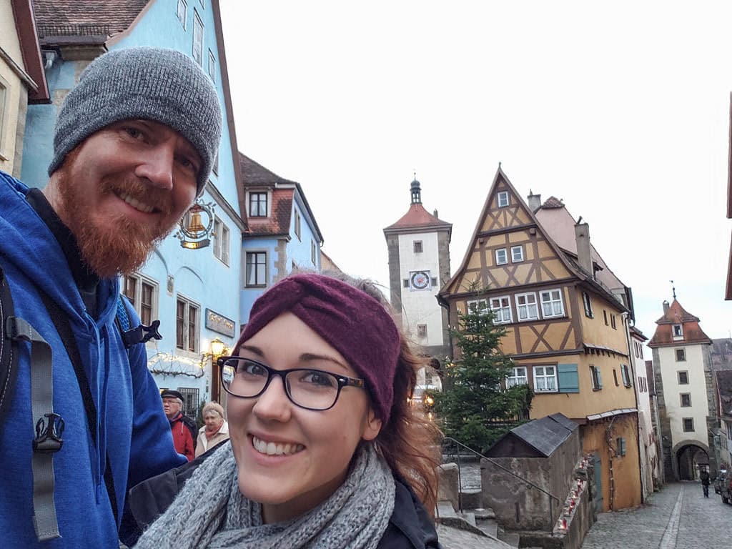 selfie in front of iconic medieval building in rothenburg germany