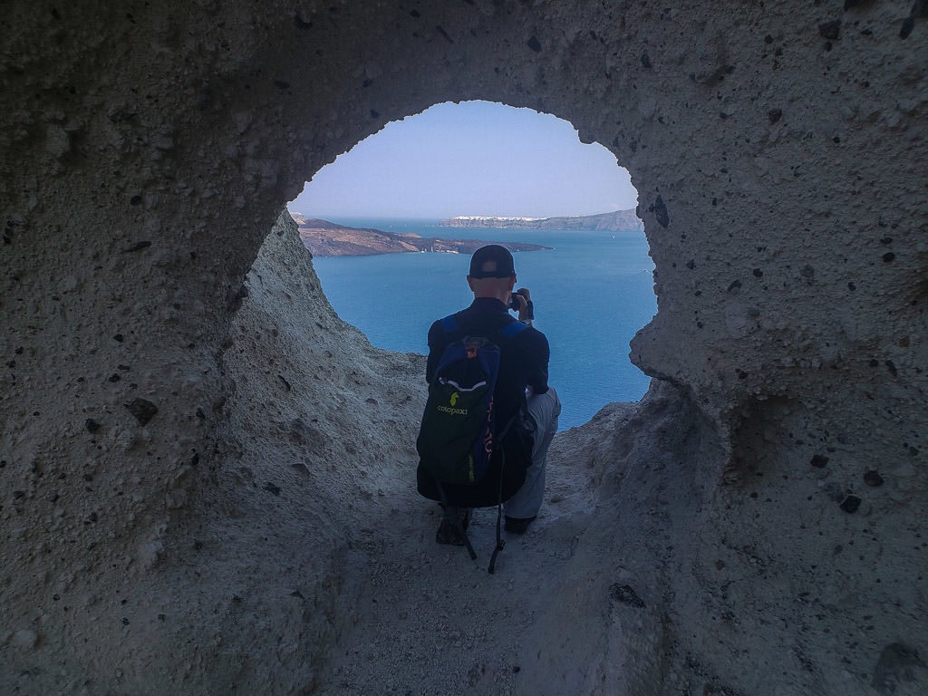 photographing view from heart of santorini megalochori