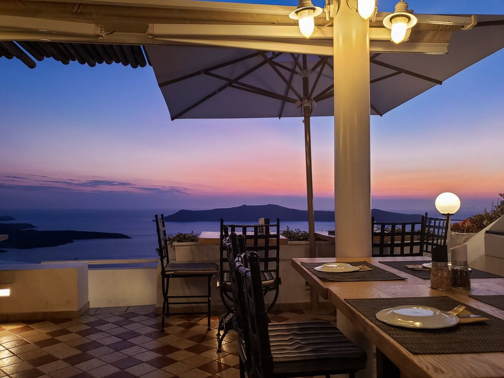 things to do in santorini - fira sunset at restaurant