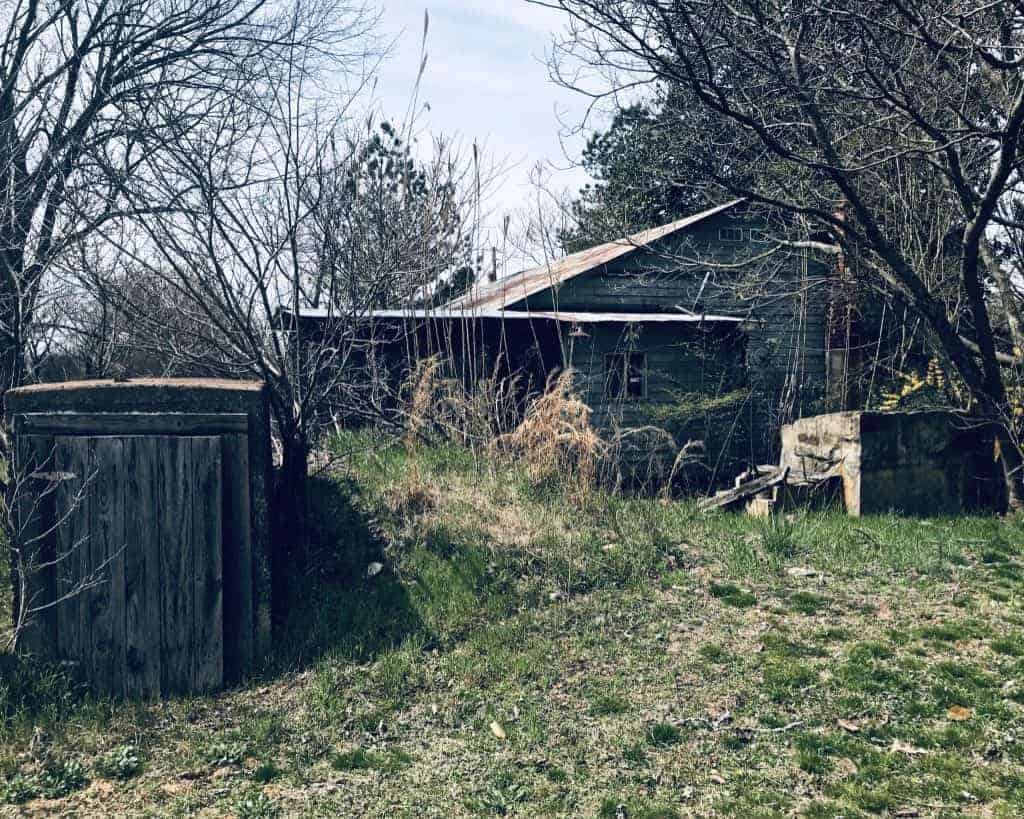 Storm cellar and well at old homestead in Arkansas