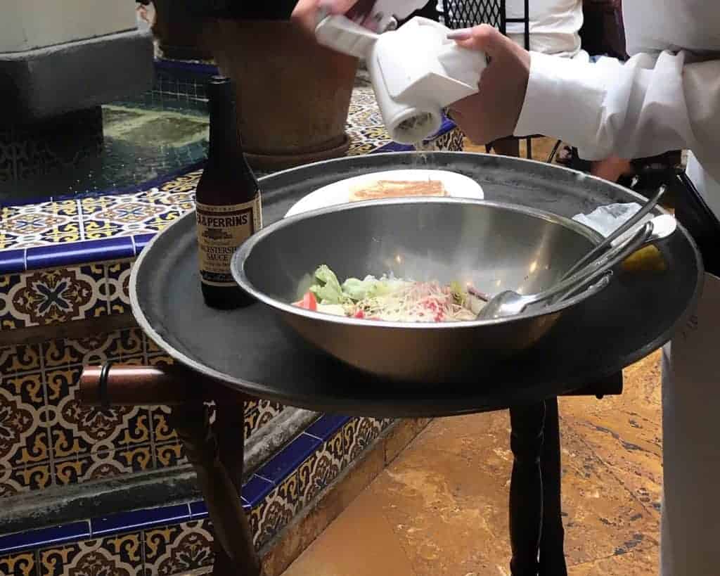 Wait staff creating tableside salad - cooking shows on Netflix