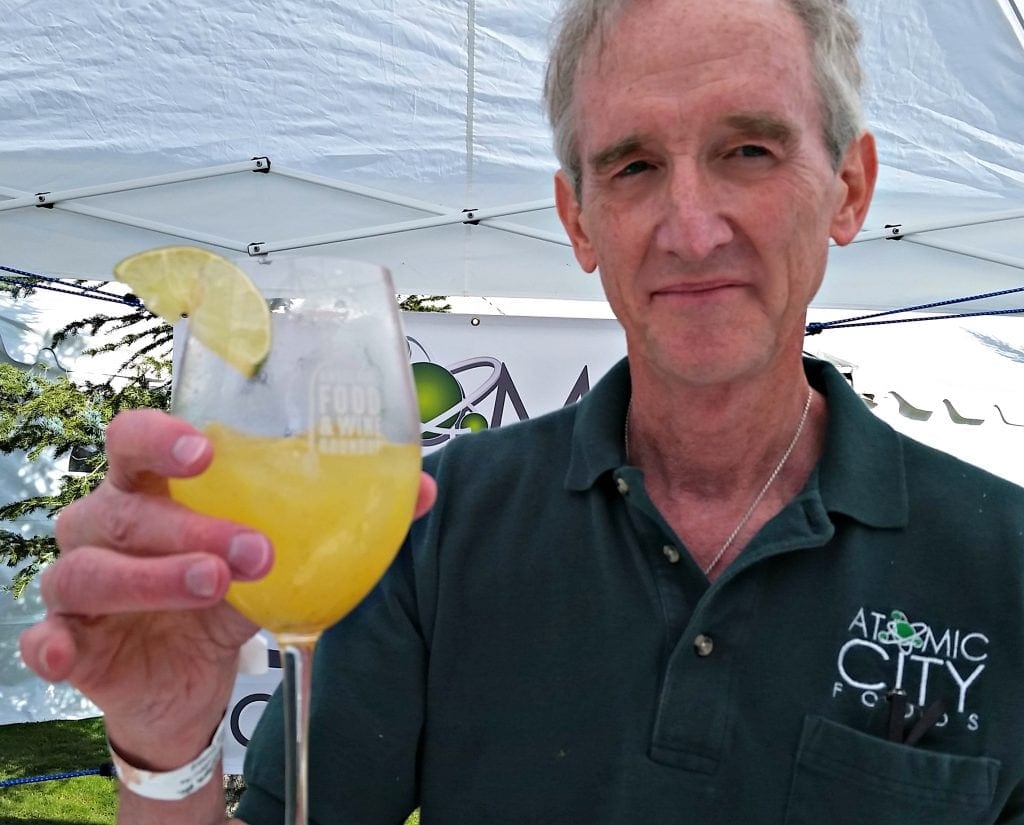 Spook Keller holds Pina Colada with Radioactive Hot Sauce