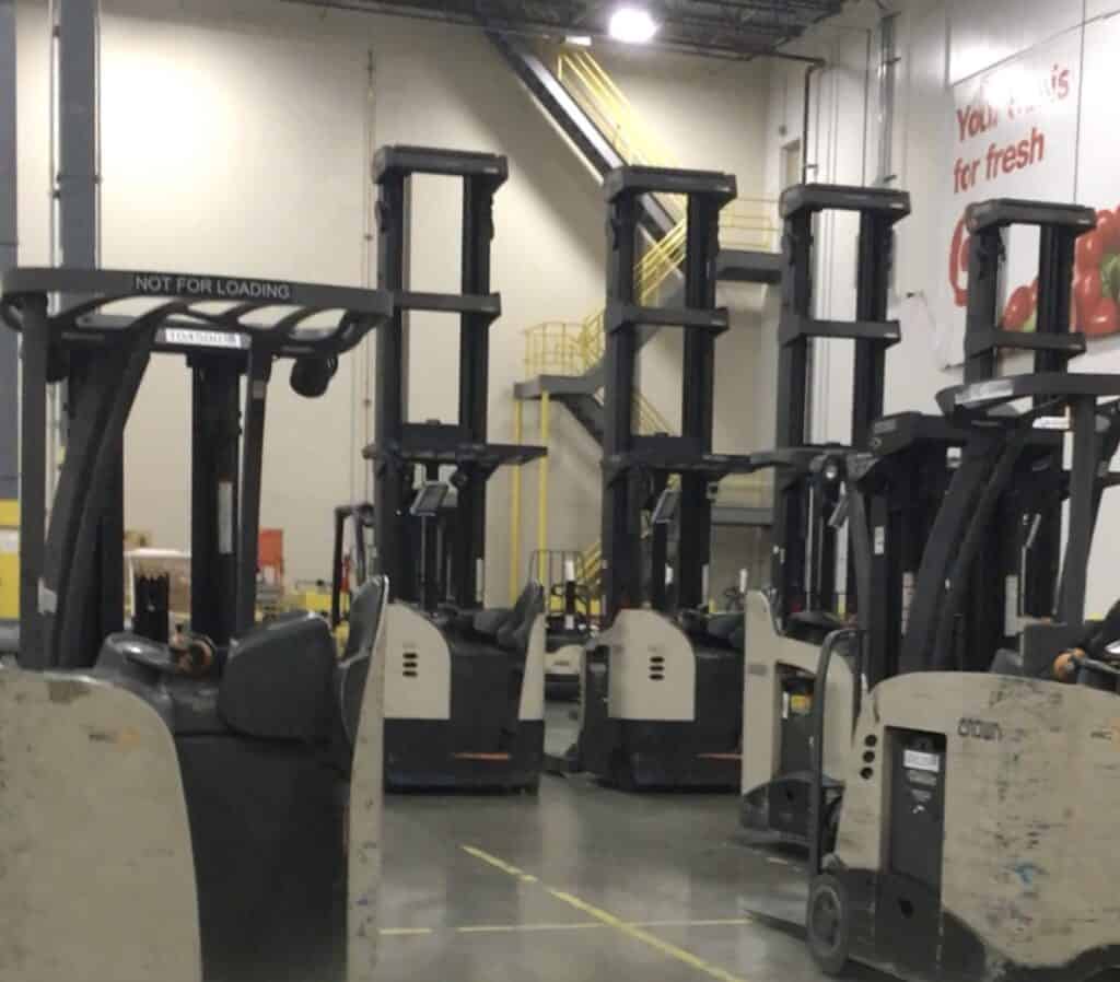 forklifts at a warehouse facility