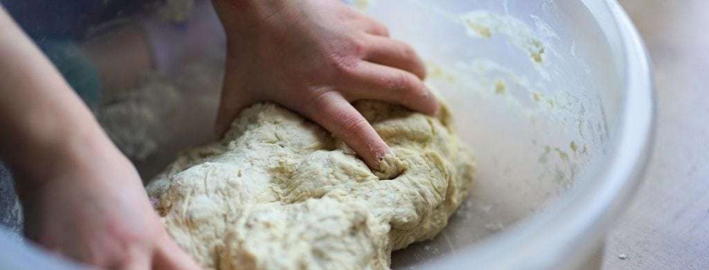 Baker's yeast is alive when baking begins, which allows the bread to rise