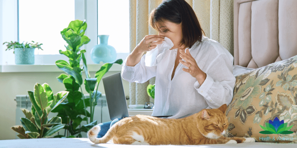 woman sneezing from cat seeking natural hay fever relief