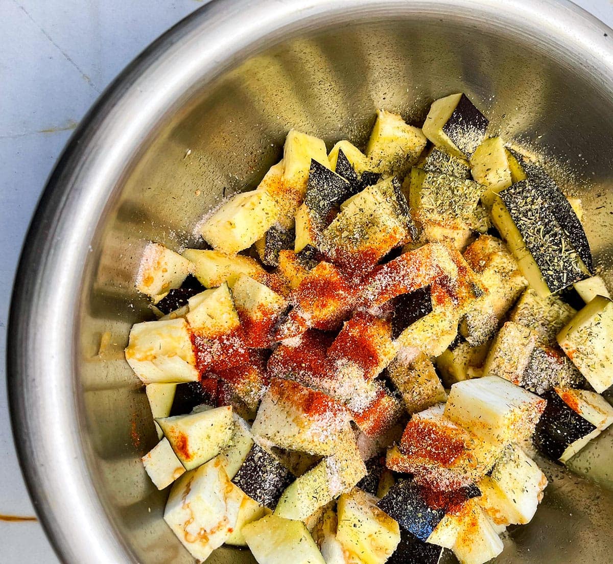 seasoned eggplant cubes in a bowl